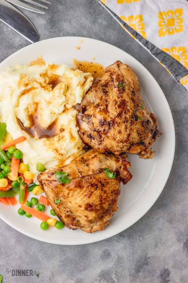 stove top chicken thighs served with creamy garlic mashed potatoes, gravy and mixed veg.