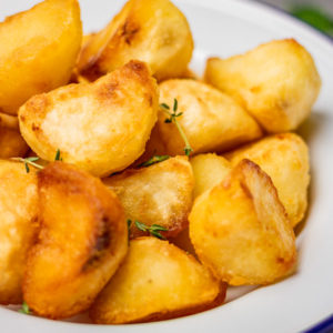crunchy and fluffy perfect roast potatoes.