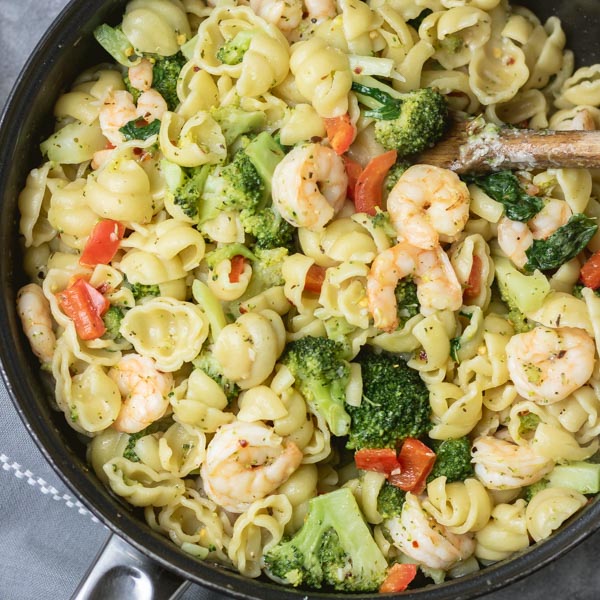 pasta with broccoli and shrimp cooked in olive oil, peppers and garlic.