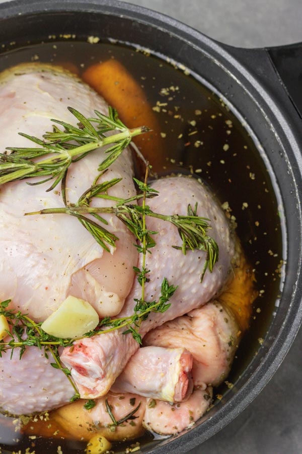 chicken in brine made from salt, water, brown sugar, garlic, rosemary and thyme.