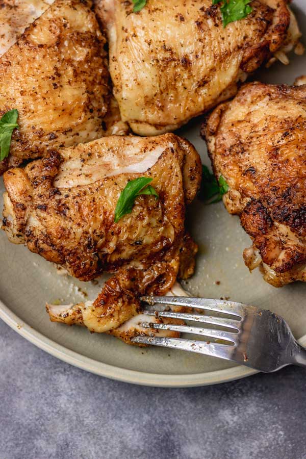 instant pot chicken thighs on a plate.