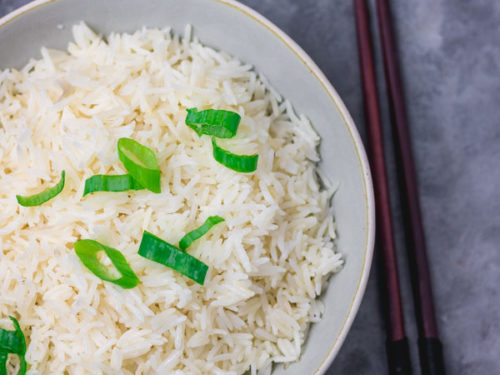 instant pot rice garnished with chopped green onions.