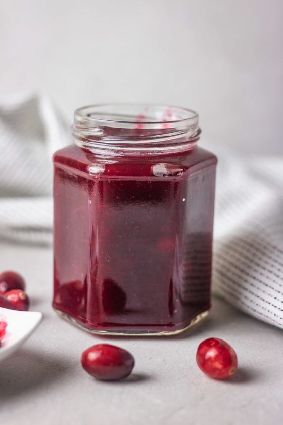 homemade instant pot cranberry sauce in a jar.
