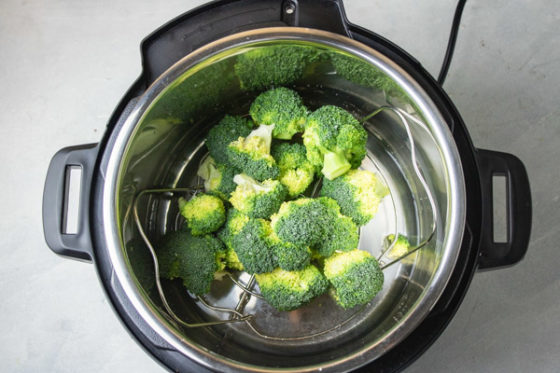 raw broccoli florets in an instant pot.