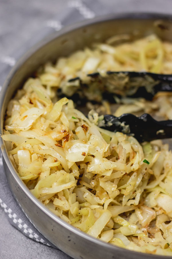 sauteed cabbage in skillet.