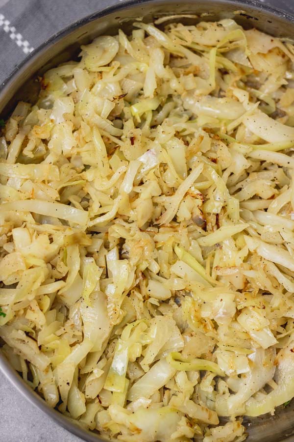 close shot of sauteed cabbage in a skillet.