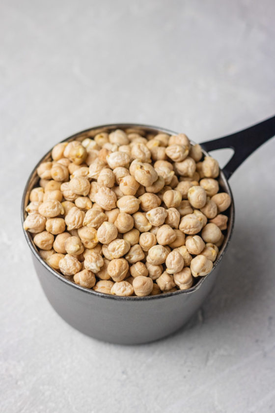A cup of dried chickpeas.
