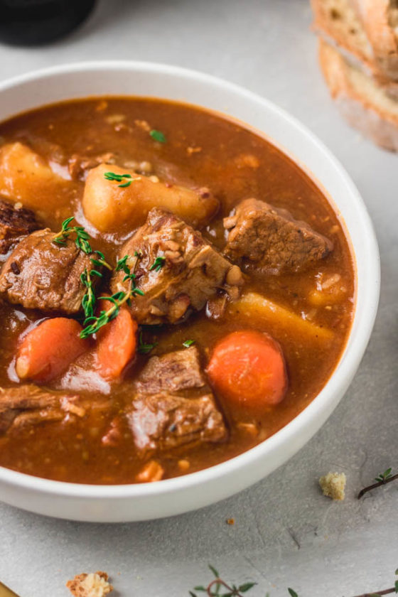 a bowl of instant pot pressure cooker beef and Guinness stew.