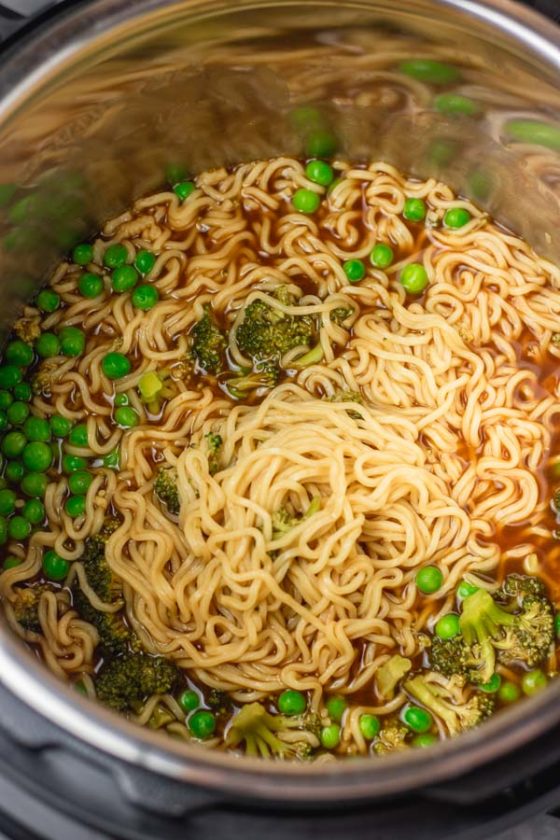 upgraded instant pot ramen noodles with peas and broccoli.