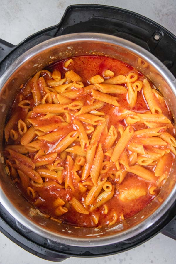 cooked pasta in tomato sauce.