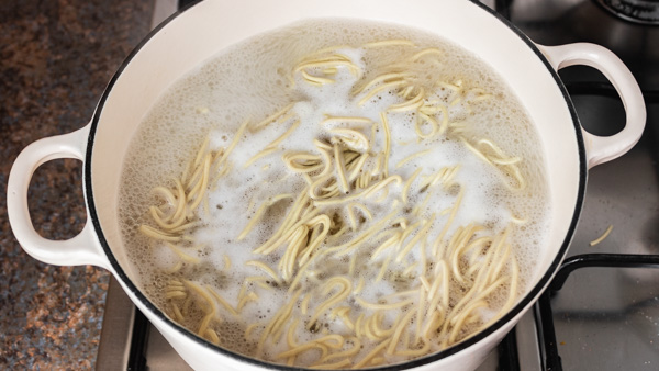 noodles boiling in pot.