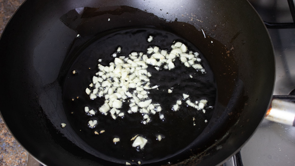 sauteing garlic in oil.