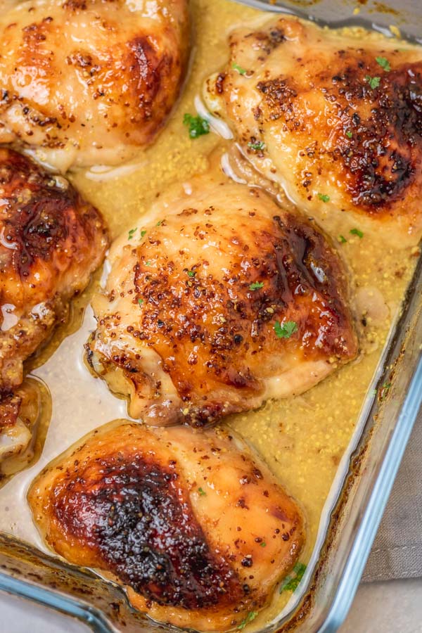 baked chicken thighs in a baking dish.