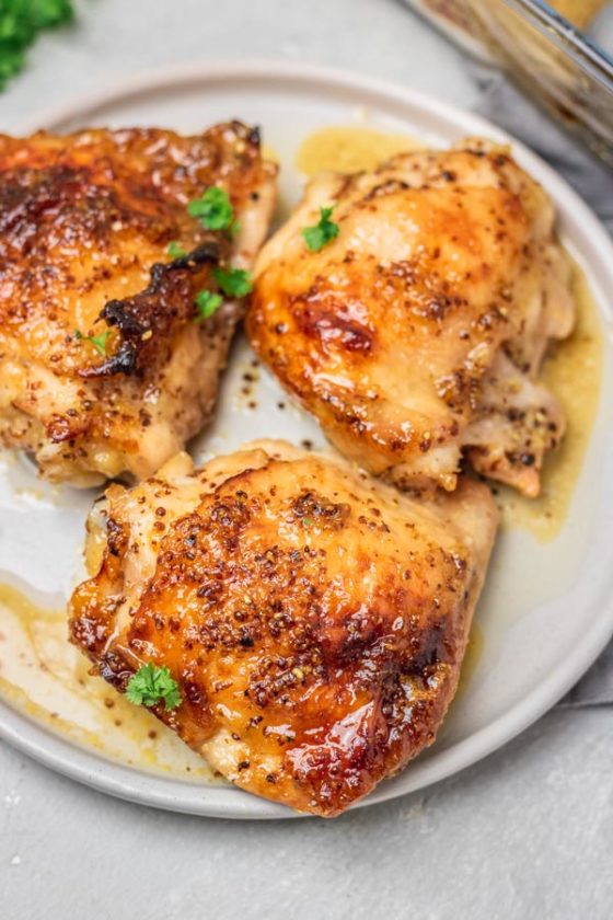 chicken thighs on a plate.