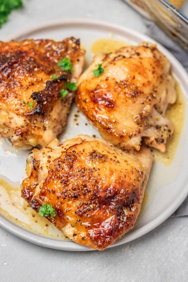 chicken thighs on a plate.