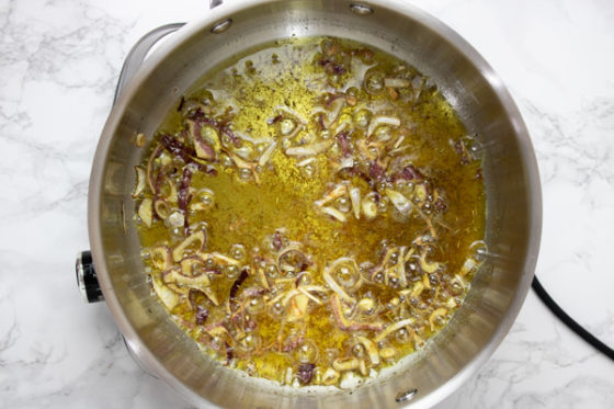 sauteing onions in oil.