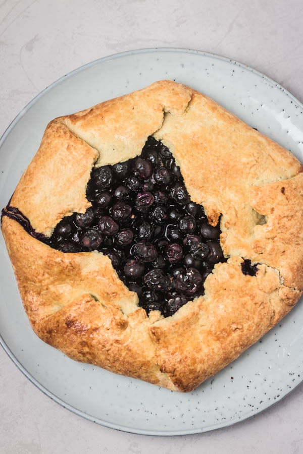 blueberry galette on a plate.