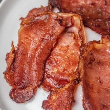 crispy bacon on a plate.