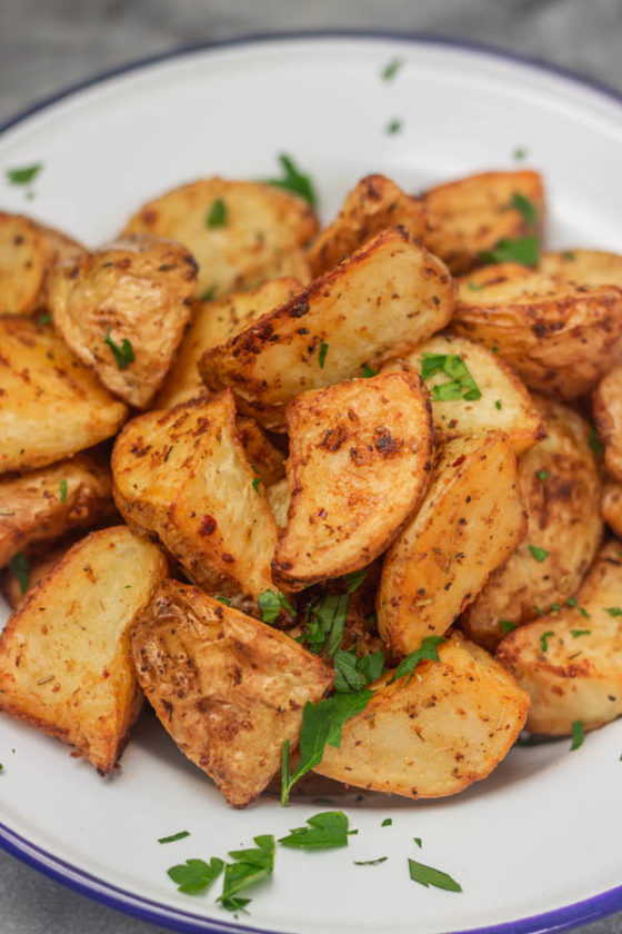 a bowl of roasted potatoes.