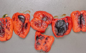roasted peppers in a baking tray.