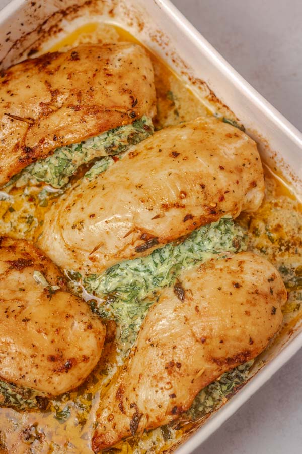 cooked chicken in a baking dish.