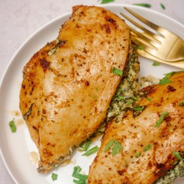 stuffed chicken breasts on a plate.