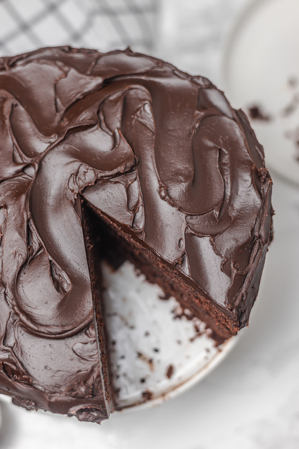the top of a cake with chocolate frosting.