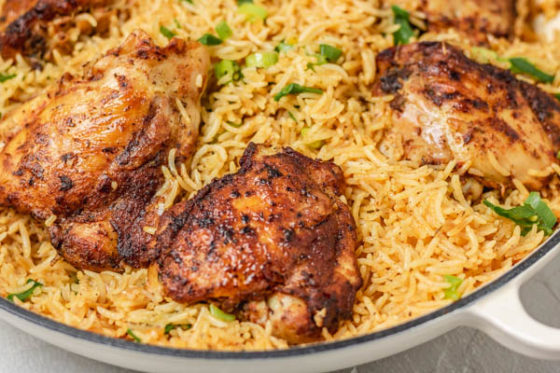 rice and chicken in a skillet.