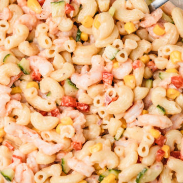 a close shot of a bowl of shrimp pasta salad.
