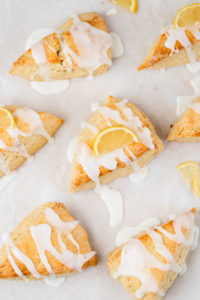 the overhead shot of lemon scones with icing glazing.