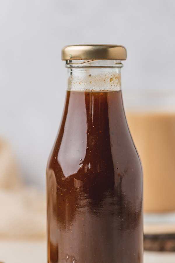 a close up on a bottle of pumpkin spice syrup.