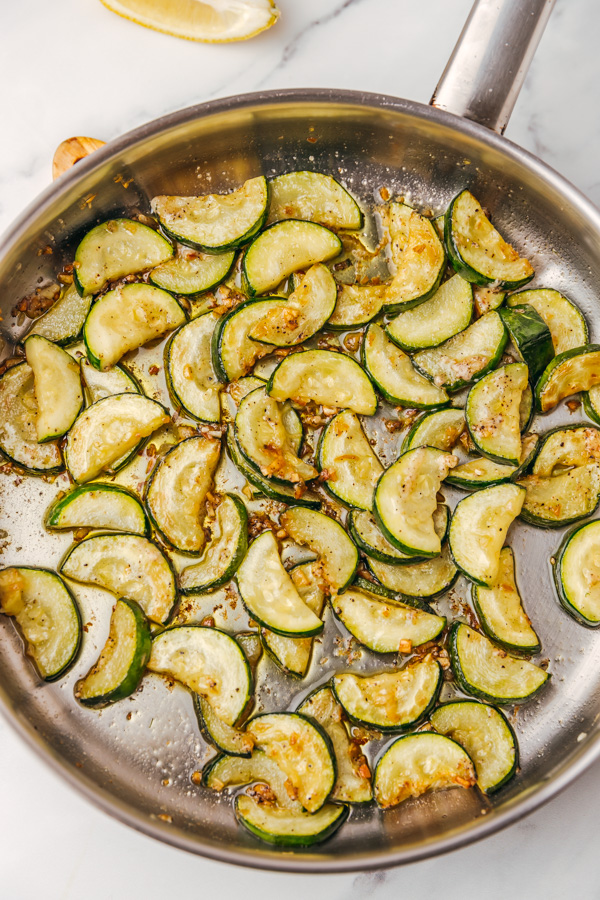 a pan of zucchini cooked on the stove.