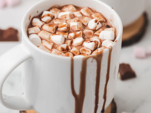 a mug of hot chcoclate with marshmallows.