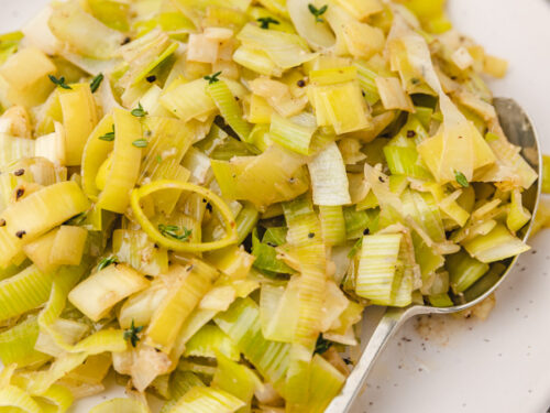 buttered leeks on a plate.