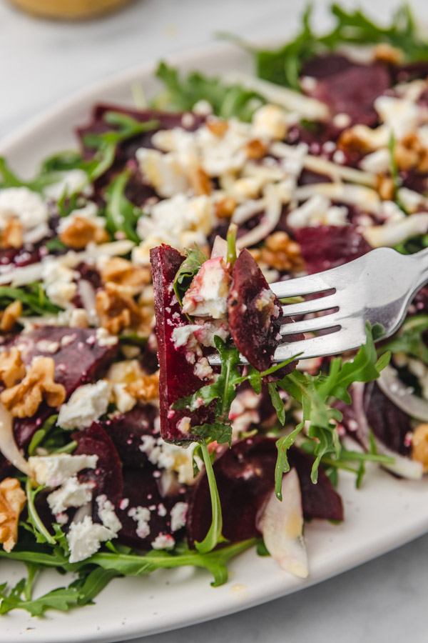 beetroot salad on a fork.