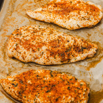 baked chicken breast on a tray.