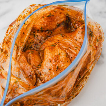marinated chicken in a ziploc bag.