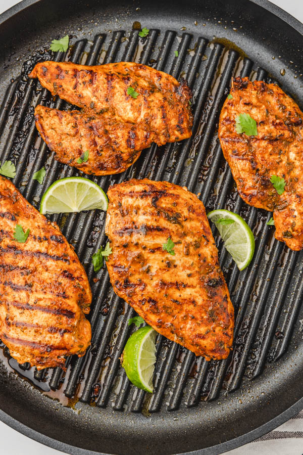 four chicken cutlets pan grilled. 
