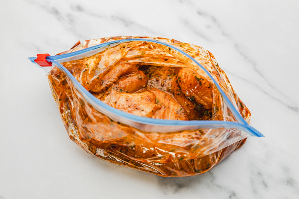 marinated chicken in a freezer bag.
