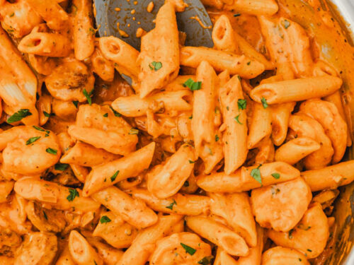 creamy chorizo and prawn pasta in a skillet.