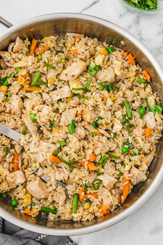 Turkey fried rice in a skillet.
