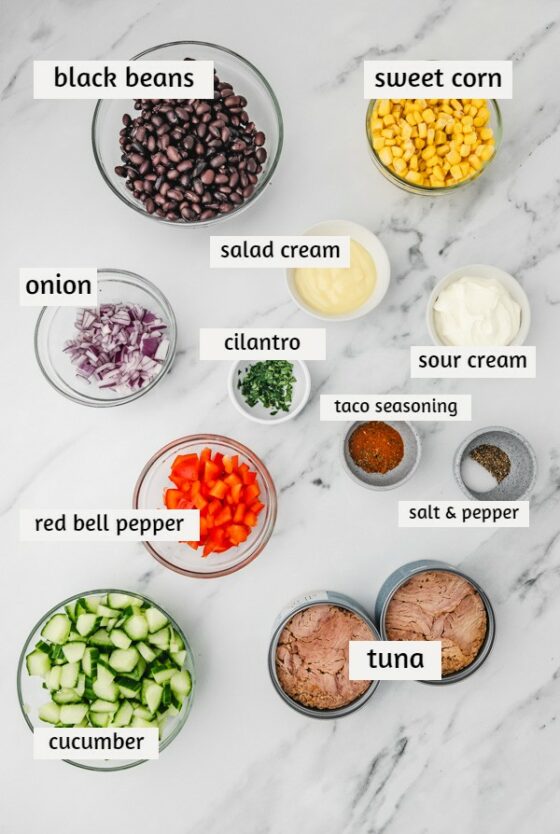 ingredients for salad on a white salad.